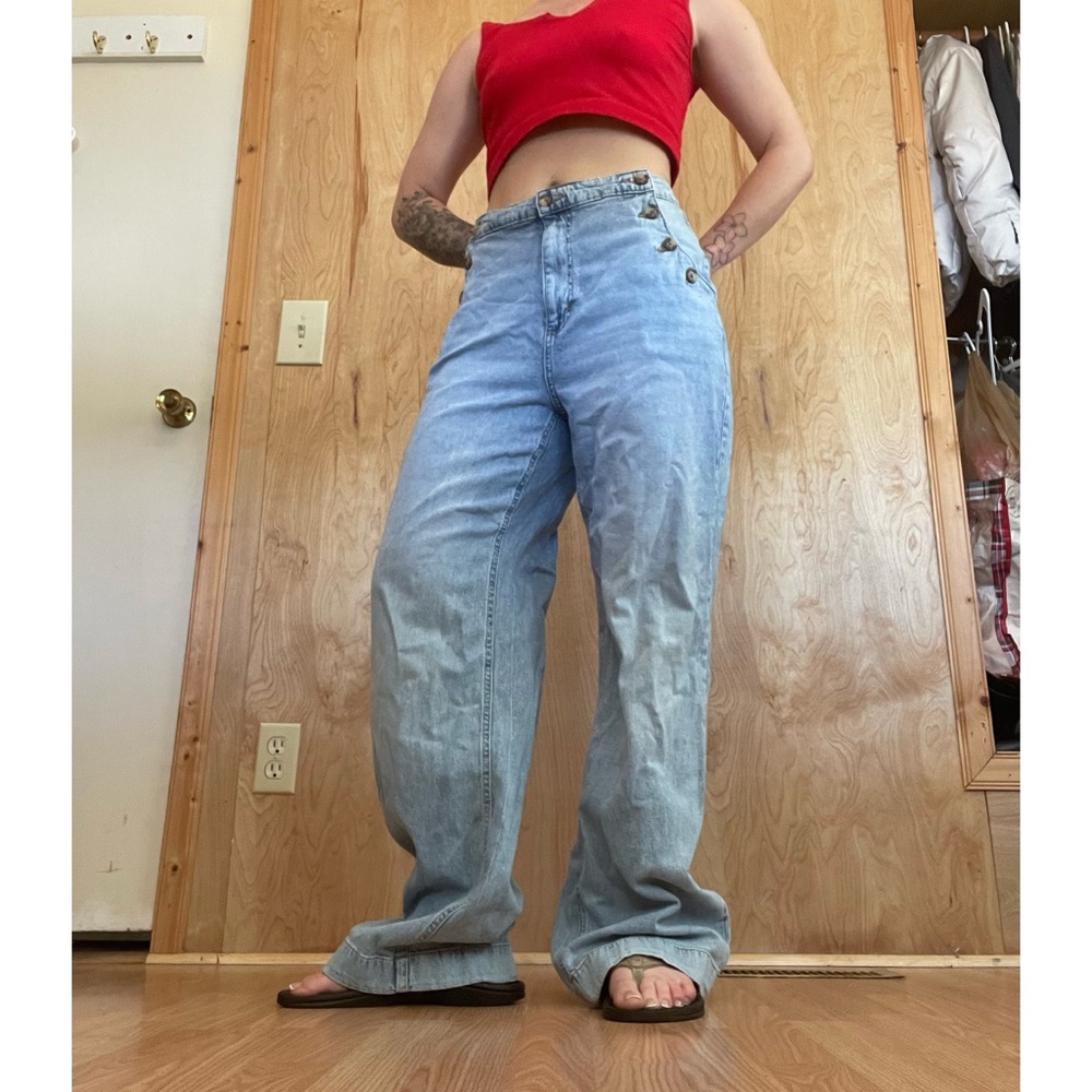 High-Rise Light Blue Wide-Leg Jeans with Side Button Detail